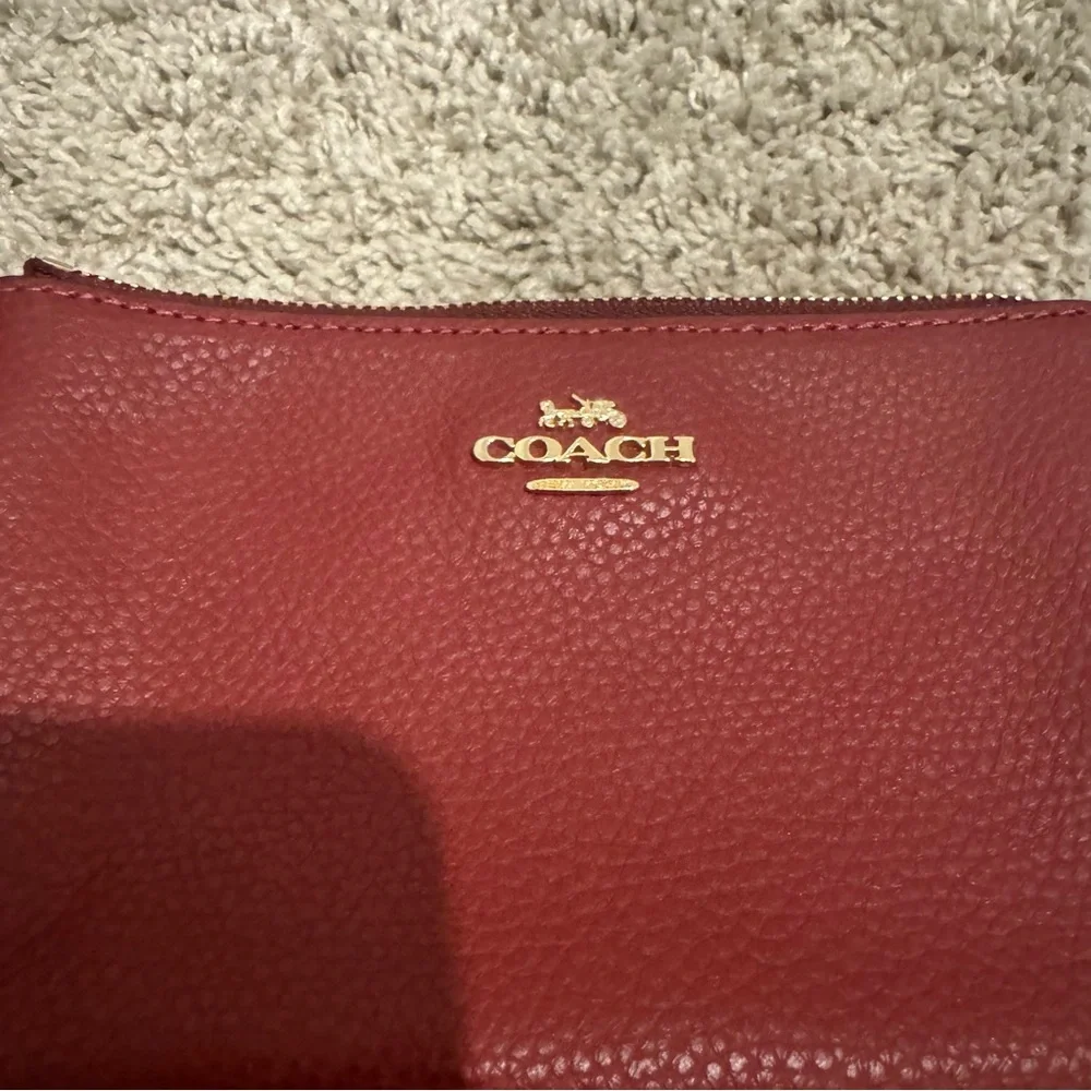Like 🆕 Coach saturated magenta mini wristlet wallet pouch